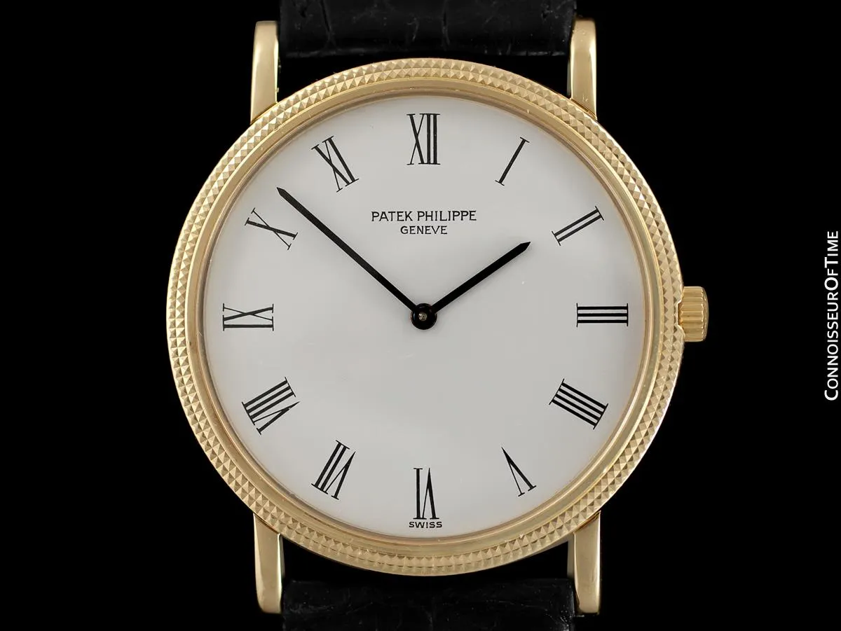 Patek Philippe Calatrava Mens Handwound Ultra Thin Watch, Ref. 3520 - 18K Gold with Hobnail Bezel