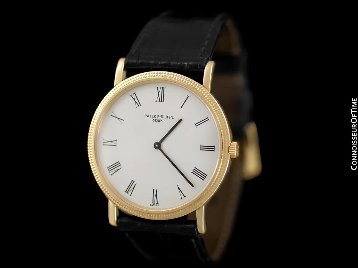 Patek Philippe Calatrava Mens Handwound Ultra Thin Watch, Ref. 3520 - 18K Gold with Hobnail Bezel
