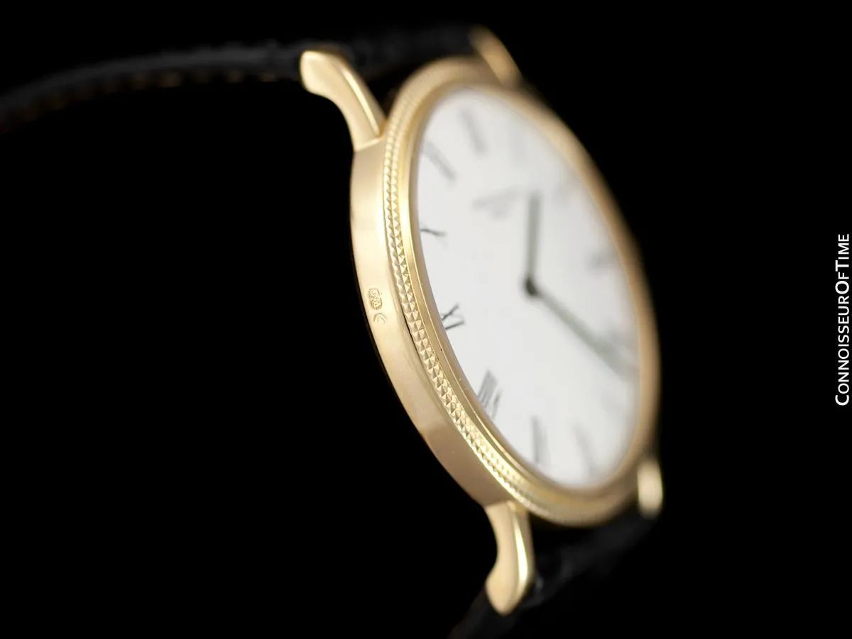 Patek Philippe Calatrava Mens Handwound Ultra Thin Watch, Ref. 3520 - 18K Gold with Hobnail Bezel