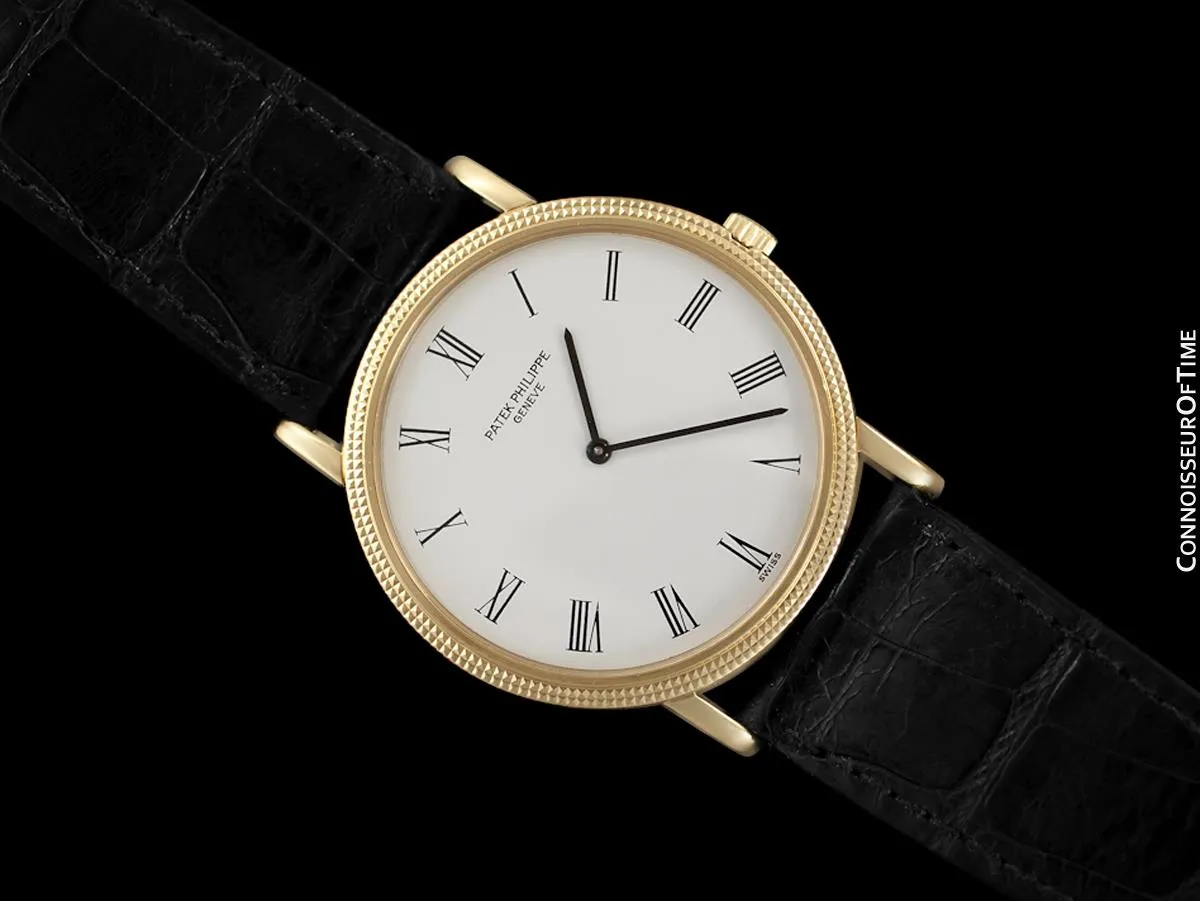 Patek Philippe Calatrava Mens Handwound Ultra Thin Watch, Ref. 3520 - 18K Gold with Hobnail Bezel