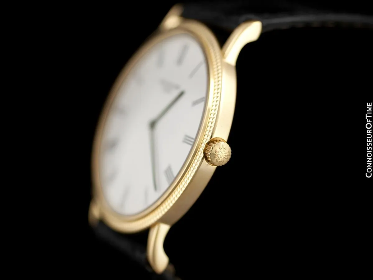 Patek Philippe Calatrava Mens Handwound Ultra Thin Watch, Ref. 3520 - 18K Gold with Hobnail Bezel